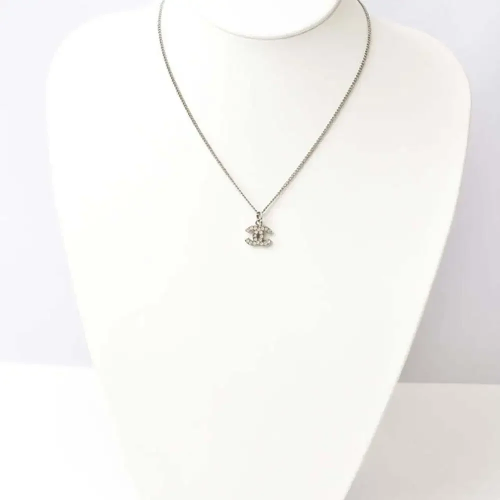 CHANEL Authentic White Logo Necklace